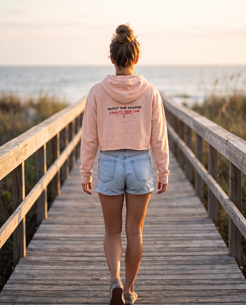Protect Your Daughter Educate Your Son crop hoodie | small heart graphic
