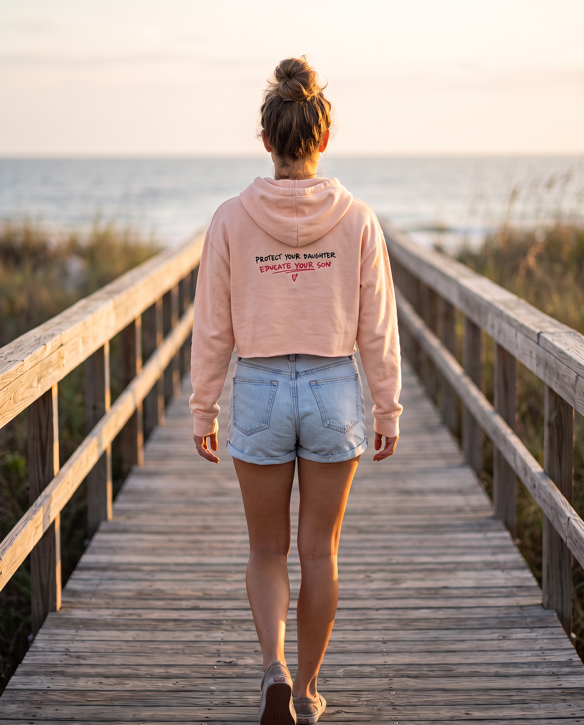 Protect Your Daughter Educate Your Son crop hoodie | small heart graphic