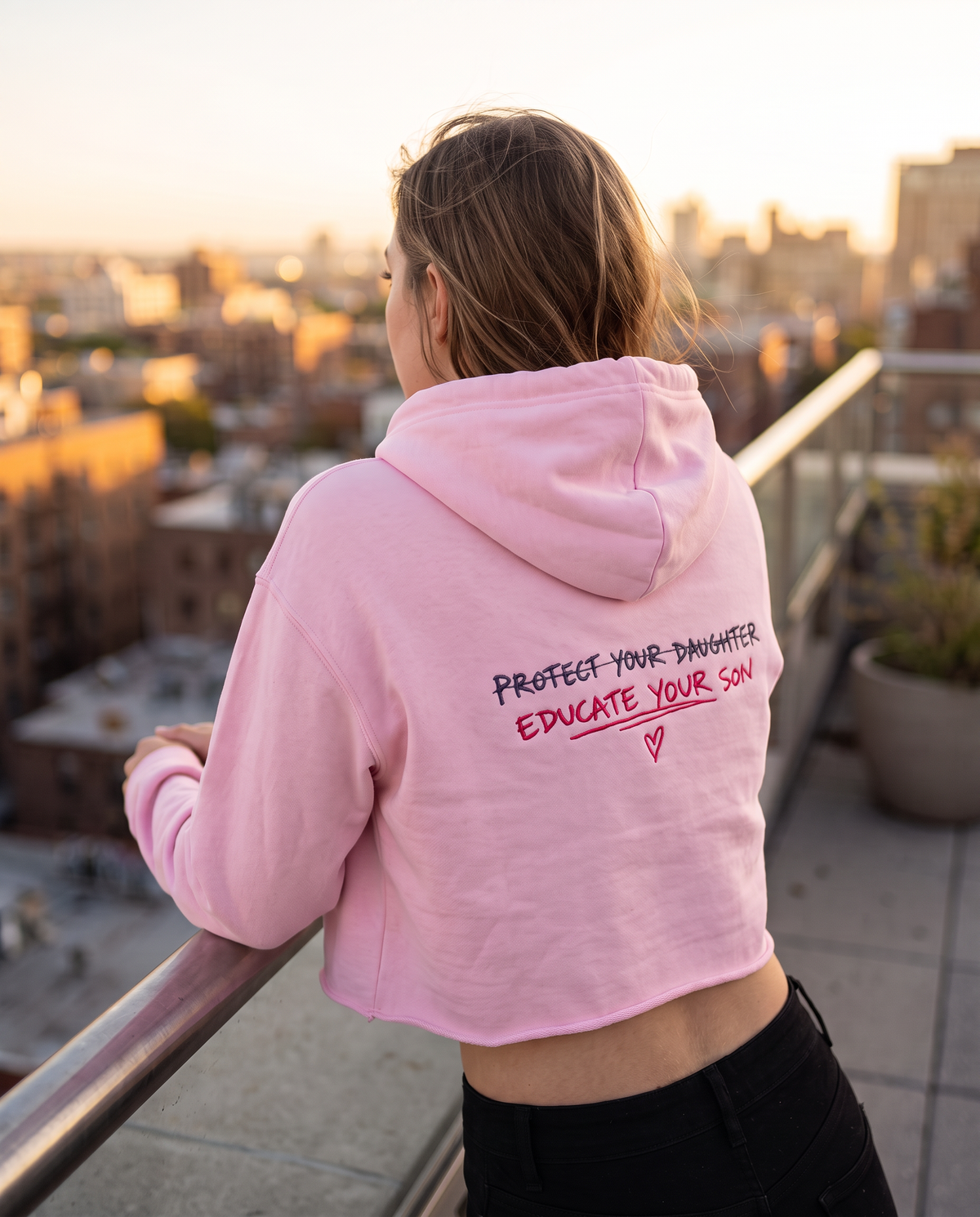 Protect Your Daughter Educate Your Son crop hoodie | small heart graphic