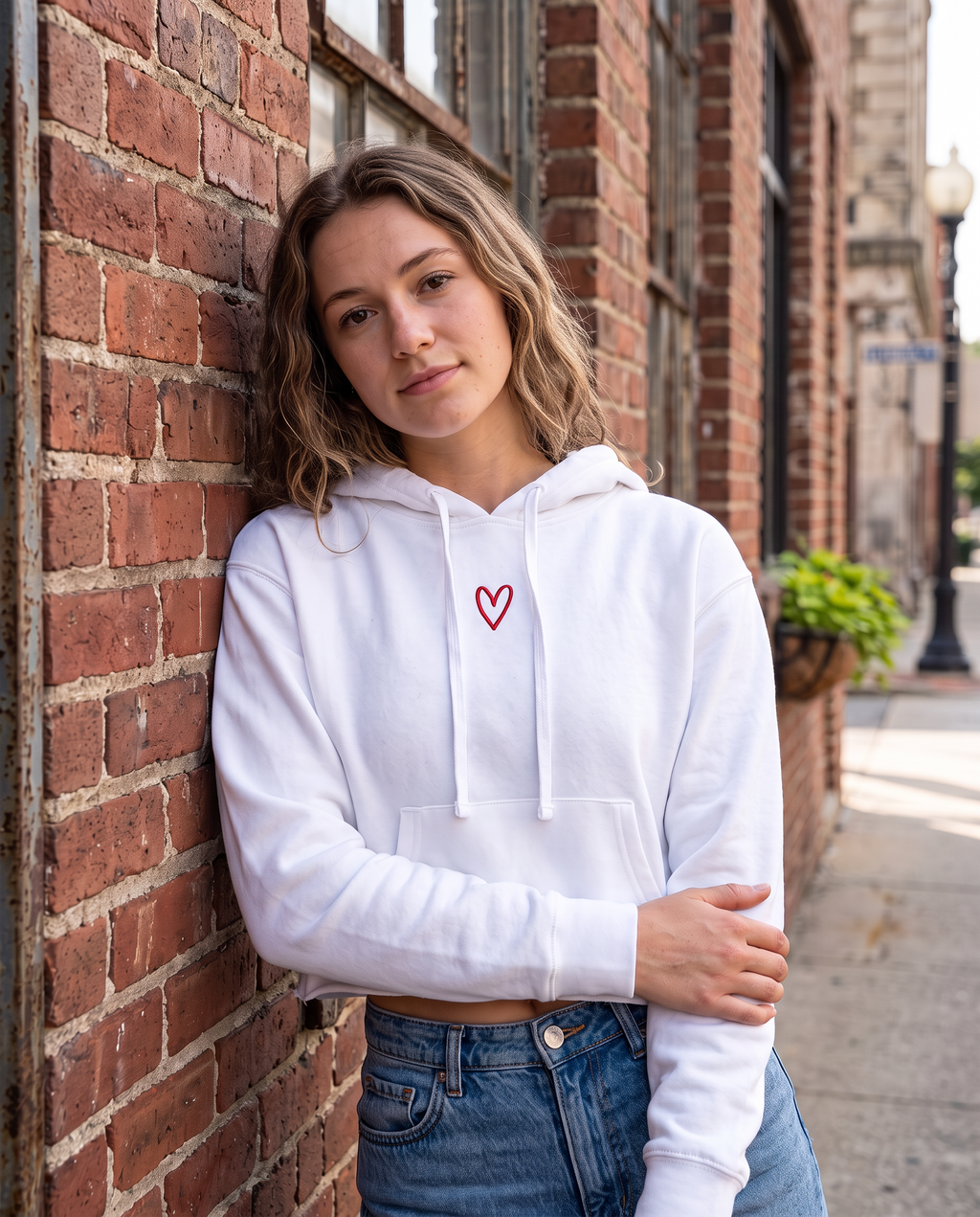 Protect Your Daughter Educate Your Son crop hoodie | small heart graphic